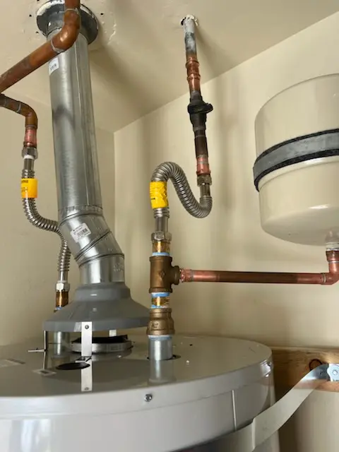 Water heater installation and plumbing repair in Tipton